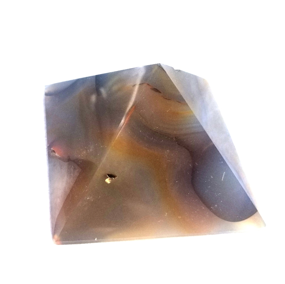 Polished rock formation energy pyramid for home